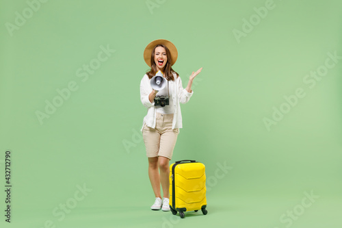 Full length traveler tourist woman in casual clothes hat hold suitcase valise sc Fototapeta