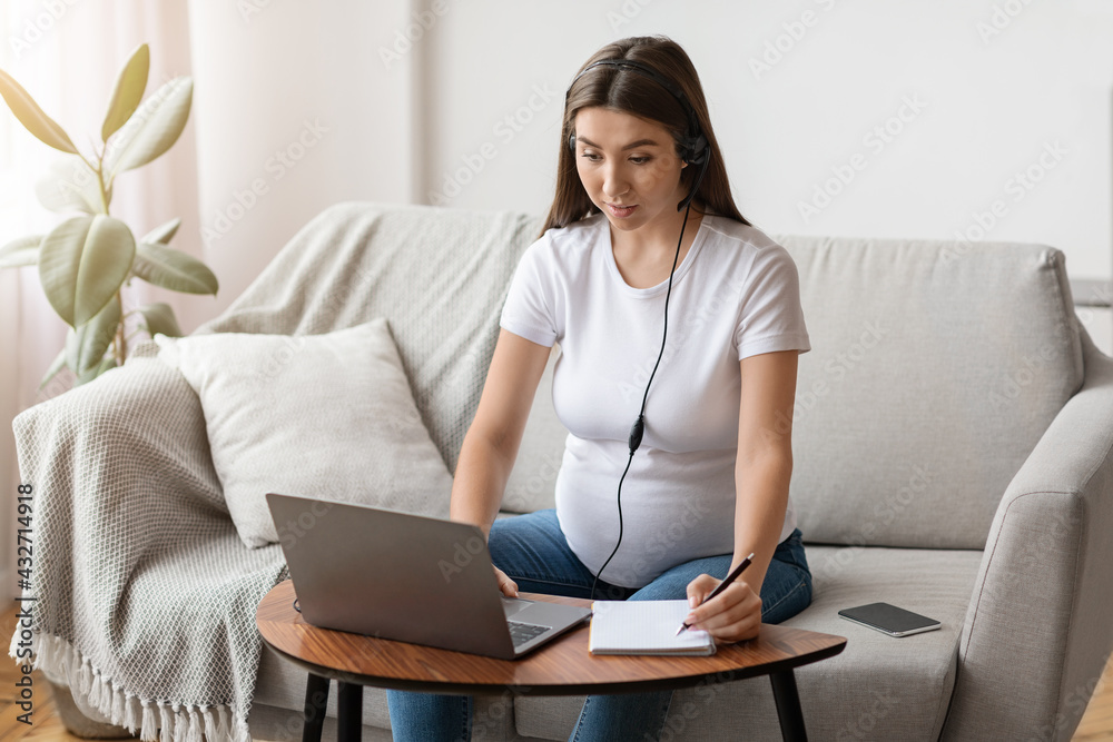 Online Courses For Future Moms. Pregnant Lady In Headset Study With Laptop Online Courses For Future Moms. Pregnant Lady In Headset Study With Laptop