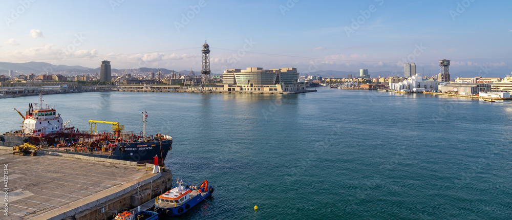 Panoramic photo of Barcelona seaside and famous buildings taked in Port Vell, Maremagnum. Barcelona, Spain. 