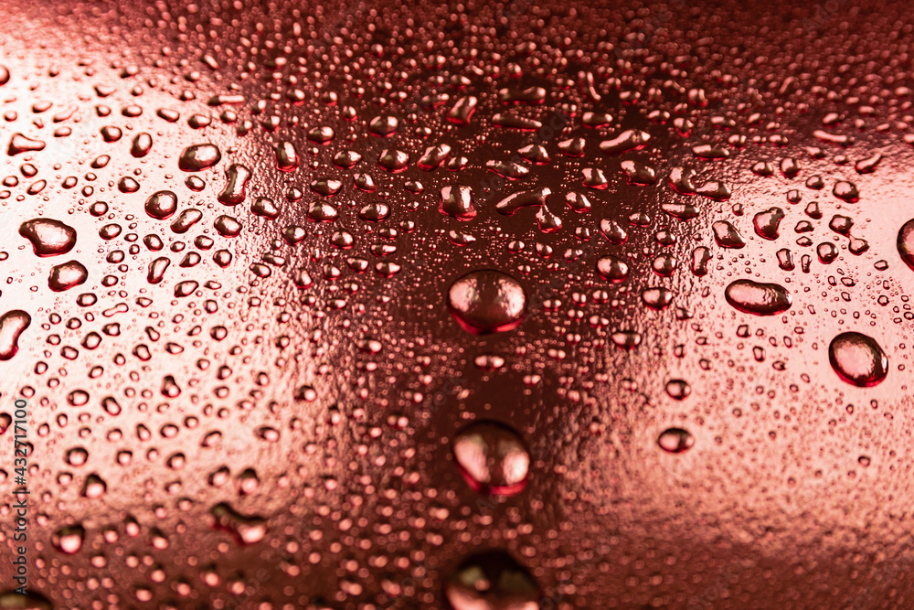 Abstract background with water drops on a copper surface