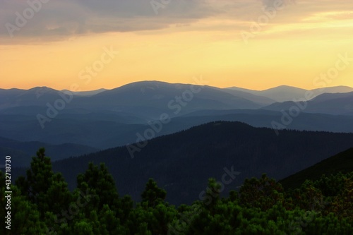 moutains view, picturesque evening meadow on slope of mountain on background of valley and wonderful sunset dramatic sky, scenic nature scene, Great smky mountains national park