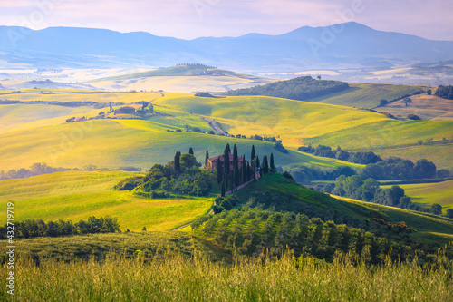 Stunning dawn scenery and house on the hill, Tuscany, Italy