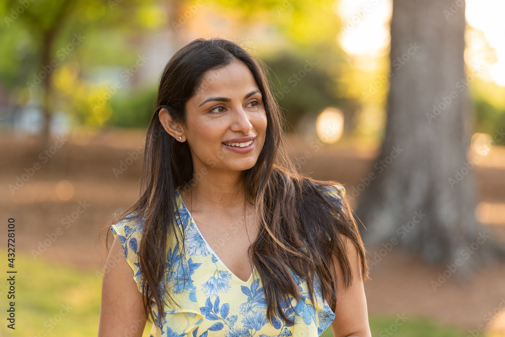 Outdoor headshots of beautiful Asian Indian woman. Outdoor headshots of beautiful Asian Indian woman.