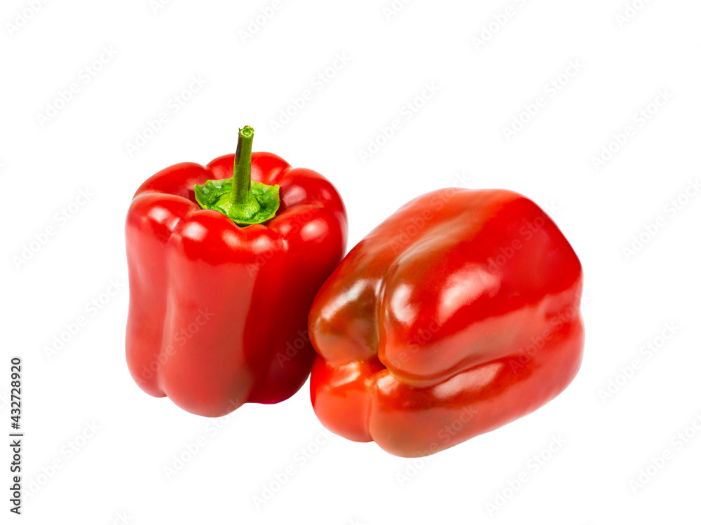 Two red bell peppers close up isolated on white background. Two red bell peppers close up isolated on white background.