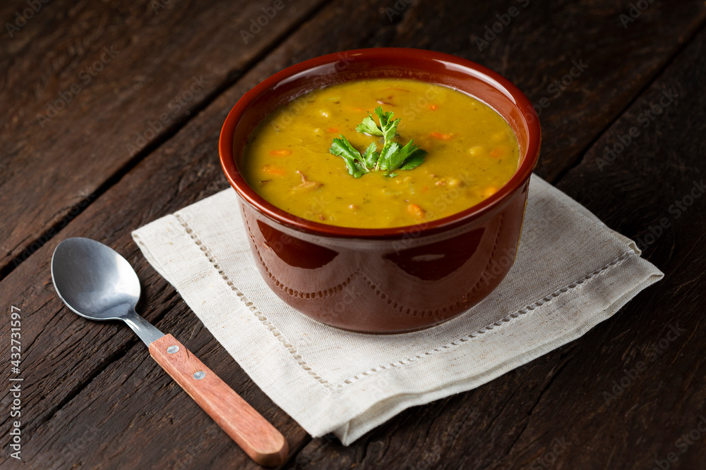Pea soup. Bowl with pea soup on the table Pea soup. Bowl with pea soup on the table