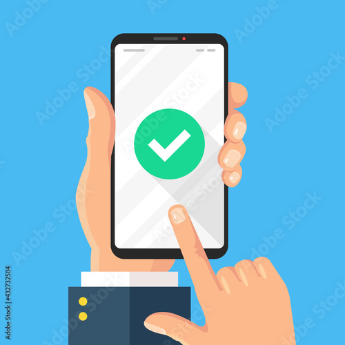 Check mark on smartphone screen. Hand holds mobile phone with green check mark icon. Modern flat design. Vector illustration