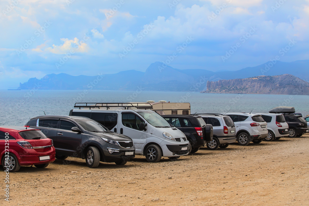 Cars on the sandy seashore