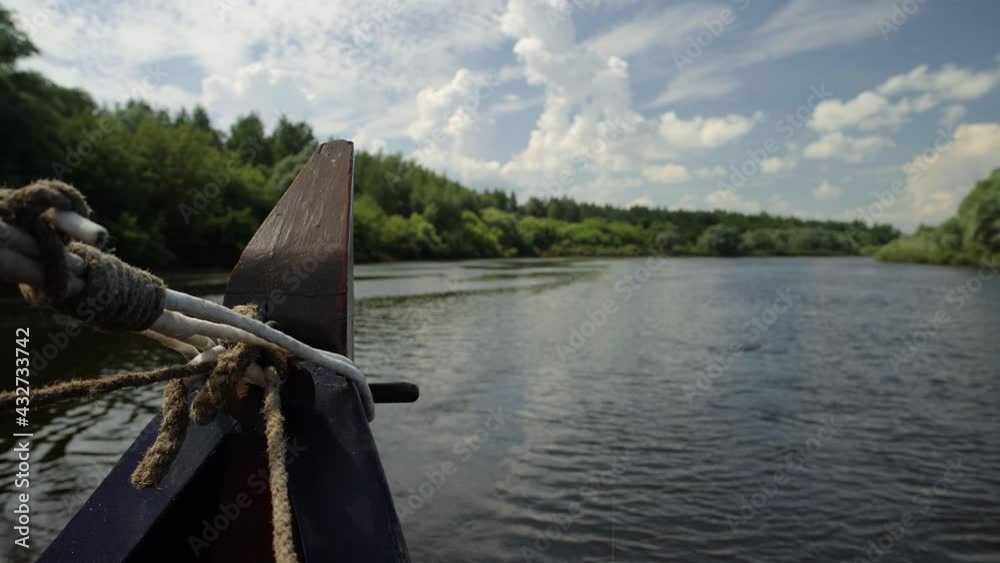 Viking boat sails, against a background of clouds sky Viking boat sails, against a background of clouds sky