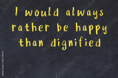 Fotografie Chalk wise inscription on black chalkboard
