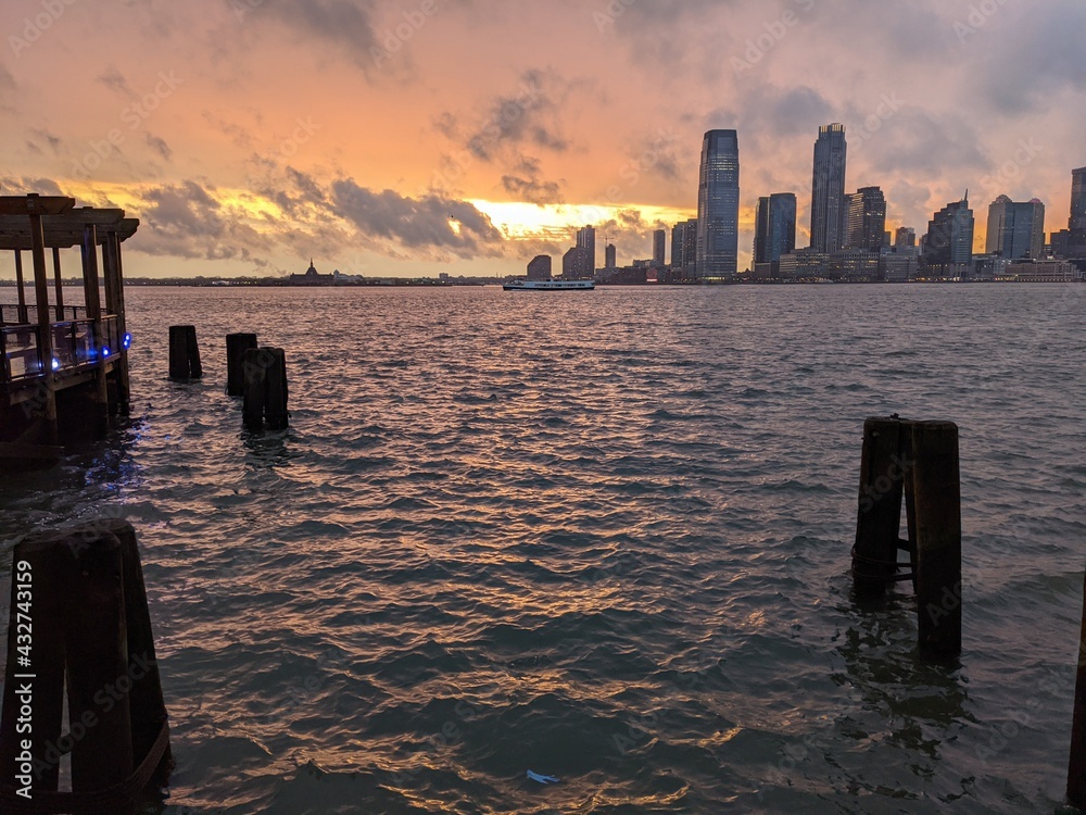 Sunset over the Hudson River and Jersey City from Manhattan, New York City, NY - April 2021