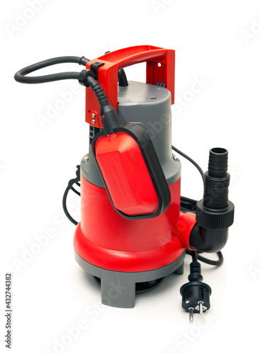 Drain pump with red plastic housing on white
