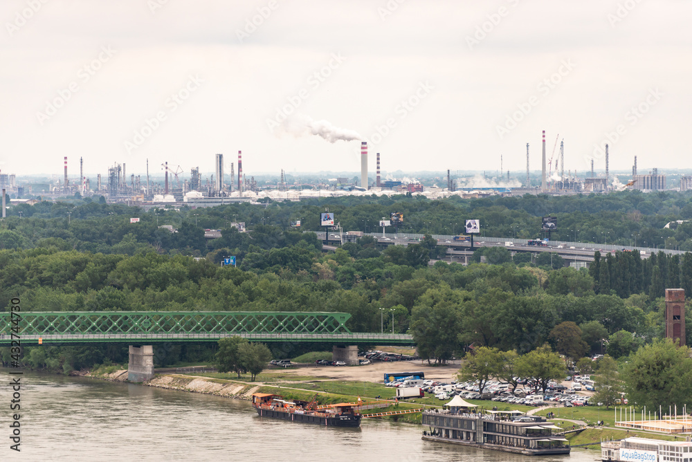 Obraz premium Bratislava. Slovakia. May 2019. Industrial Bratislava in spring. Huge industrial production on the entire horizon. Construction cluster in Slovakia.