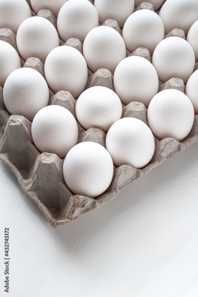Vertical view of a Package Cardboard Egg Holder Egg Tray with eggs Vertical view of a Package Cardboard Egg Holder Egg Tray with eggs