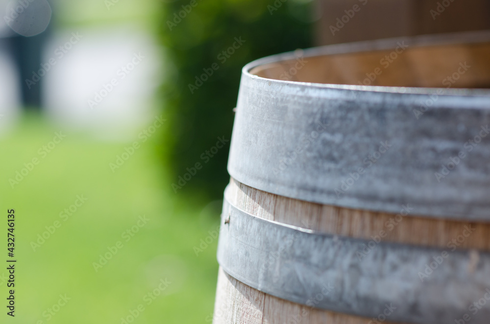 Wine: detail of a wooden barrel, precious woods are always used to age the wine. Wine: detail of a wooden barrel, precious woods are always used to age the wine.