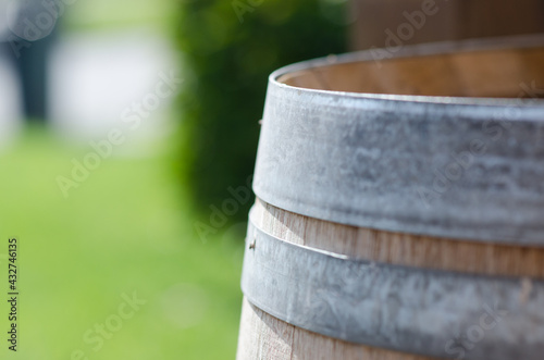 Wine: detail of a wooden barrel, precious woods are always used to age the wine.