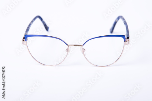 Eyeglasses on white background with copyspace