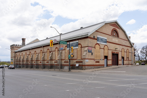 
Brantford, On, Canada - May 8, 2021: Brantford Armoury (Sgt. William Merrifield Armoury) window replacement construction site in Brantford, On, Canada.  The Armoury is a Federal Heritage Building.
 photo