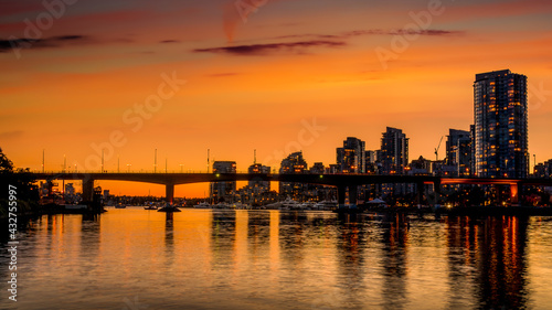 Orange Sky from the Sun setting over the Cambie Bridge and the Vancouver Yale Town Skyline at the North Shore of False Creek, British Columbia, Canada © hpbfotos