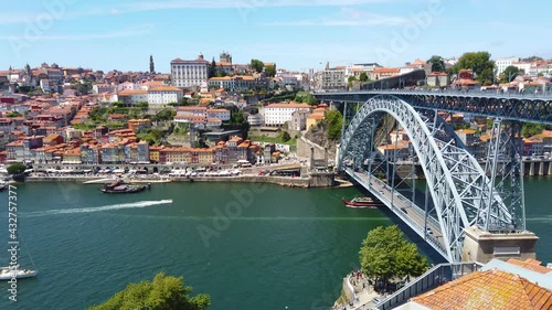 The view of Dom Luis I Bridge, the old town, and Douro River in Porto, Portugal