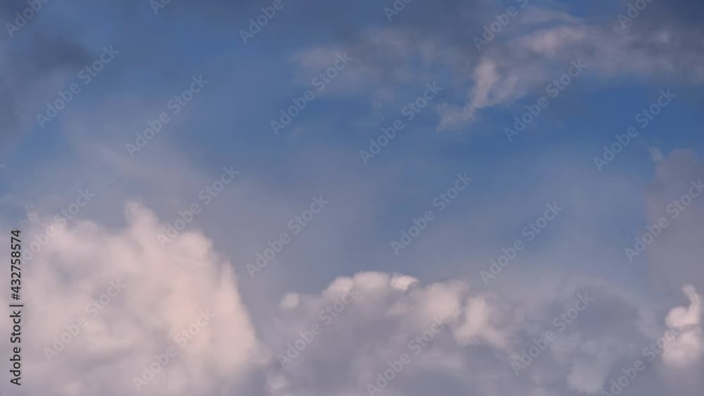 4K Time lapse, Gray and white rolling puffy clouds floating in the sky. 4K Time lapse, Gray and white rolling puffy clouds floating in the sky.