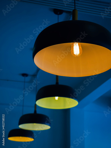 Row of modern round ceiling lights.