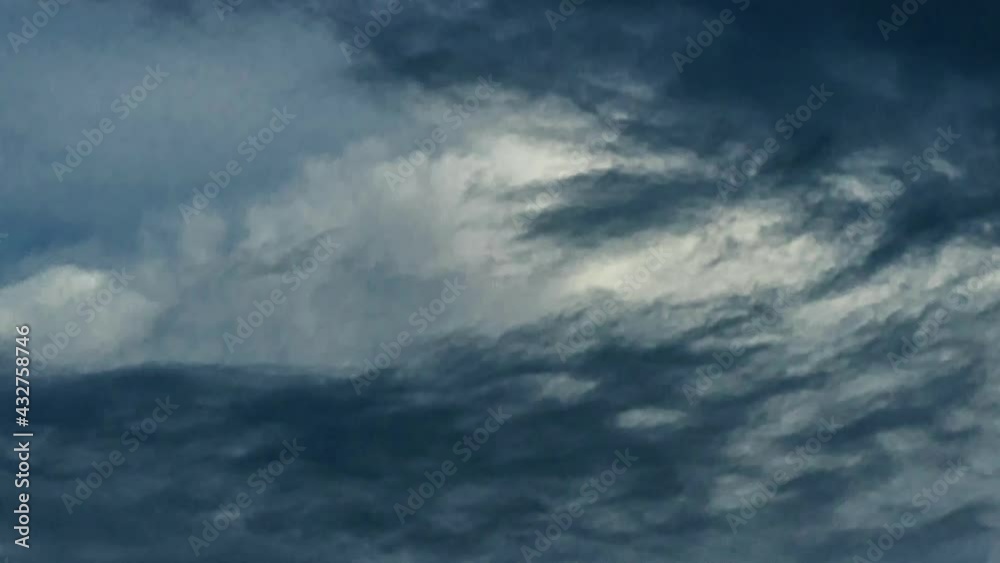 4K Time lapse, Gray and white rolling puffy clouds floating in the sky. 4K Time lapse, Gray and white rolling puffy clouds floating in the sky.