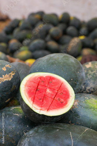 pile of watemelons in store	
