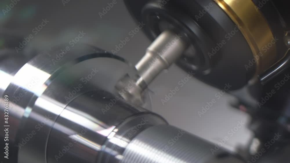 cnc lathe. Industrial metal scrap. Working on high-tech machine for metal processing. Metalworking. Industry. Turning mill machine produces metal detail at modern factory, Automated CNC system spins cnc lathe. Industrial metal scrap. Working on high-tech machine for metal processing. Metalworking. Industry. Turning mill machine produces metal detail at modern factory, Automated CNC system spins
