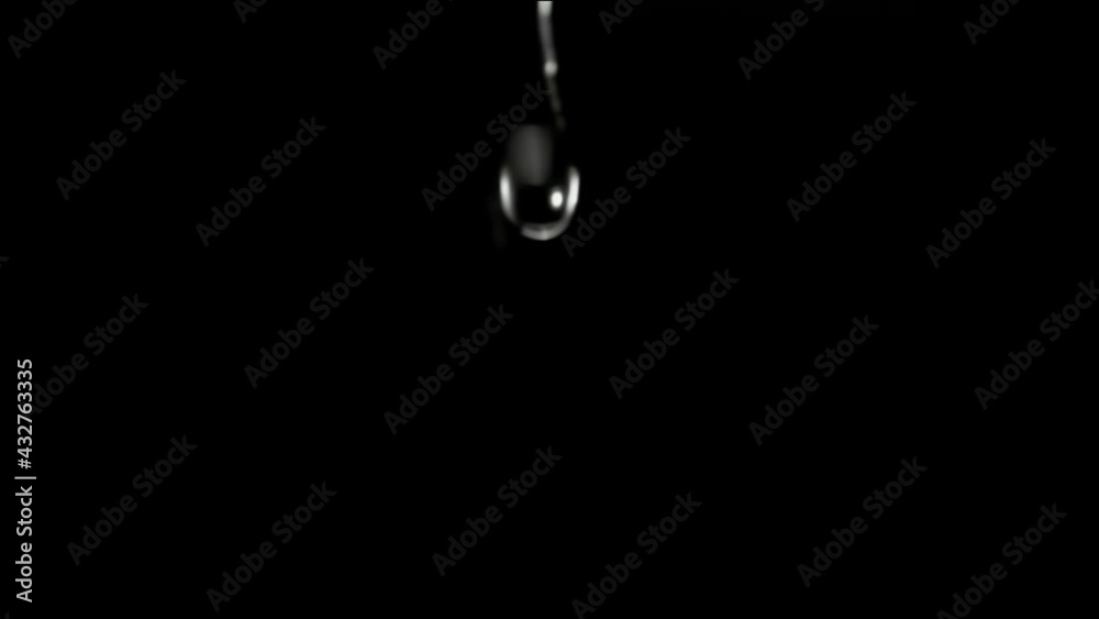 Slow Motion Drop Water In Black background