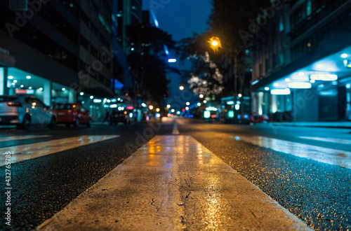 City Streets In The Rain At Night | Lights and Reflections Through Puddles On Street