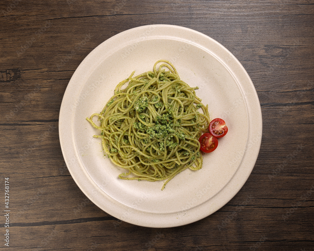Asian style spaghetti with minced chicken spinach thai basil tomato