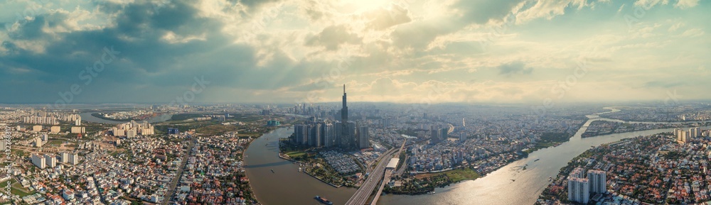 Drone view photo of Ho Chi Minh city skyline with dramatic sky 