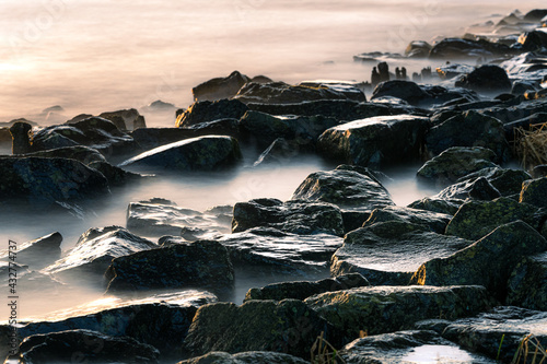 Long exposure of a romantic seascape with rocks © fotografiecor