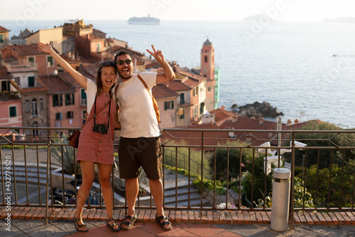 happy tourist couple in love take selfie in Tellaro village, Lerici. Holidays in Liguria region, Italia  © photomaticstudio