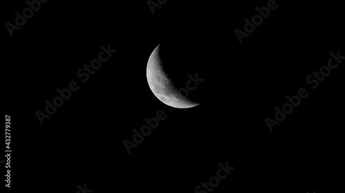 Waxing crescent moon as seeing from the southern hemisphere. Amazing the moon rough surface full of craters from meteorites coming from the universe and crashing our satellite the Moon an awe relief