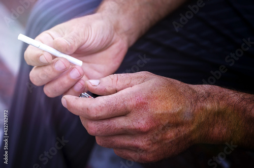 cigarette, lighter, hands. smoker