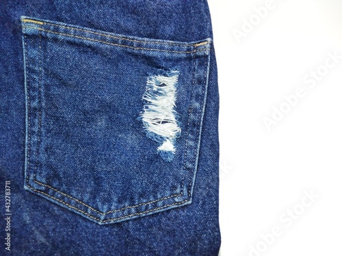 Photos The blue jeans texture has a tear, see the white fabric inside