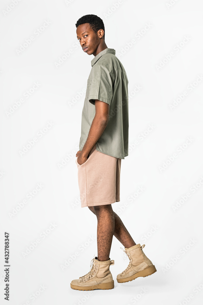 African American man in gray shirt and shorts casual wear fashion African American man in gray shirt and shorts casual wear fashion