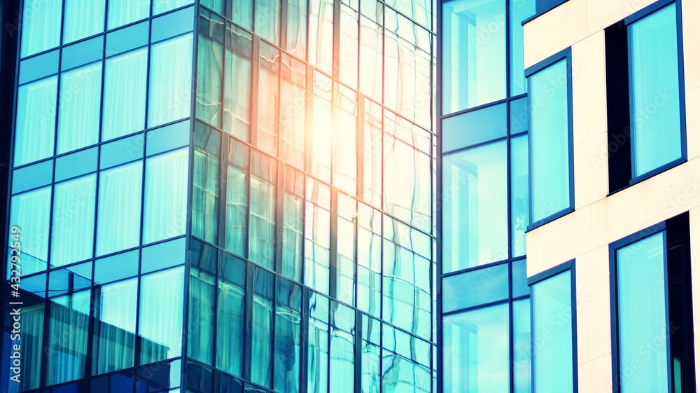 Modern building in the city with sunlight. Abstract texture and blue glass facade in modern office building., Retro stylized colorful tonal filter effect. Modern building in the city with sunlight. Abstract texture and blue glass facade in modern office building., Retro stylized colorful tonal filter effect.