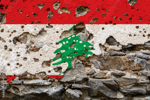 Obraz na płótnie Concept of the Political Situation in Lebanon with a damaged painted flag on a cracked wall with wholes. 3D-Illustration. 3D-rendering w salonie