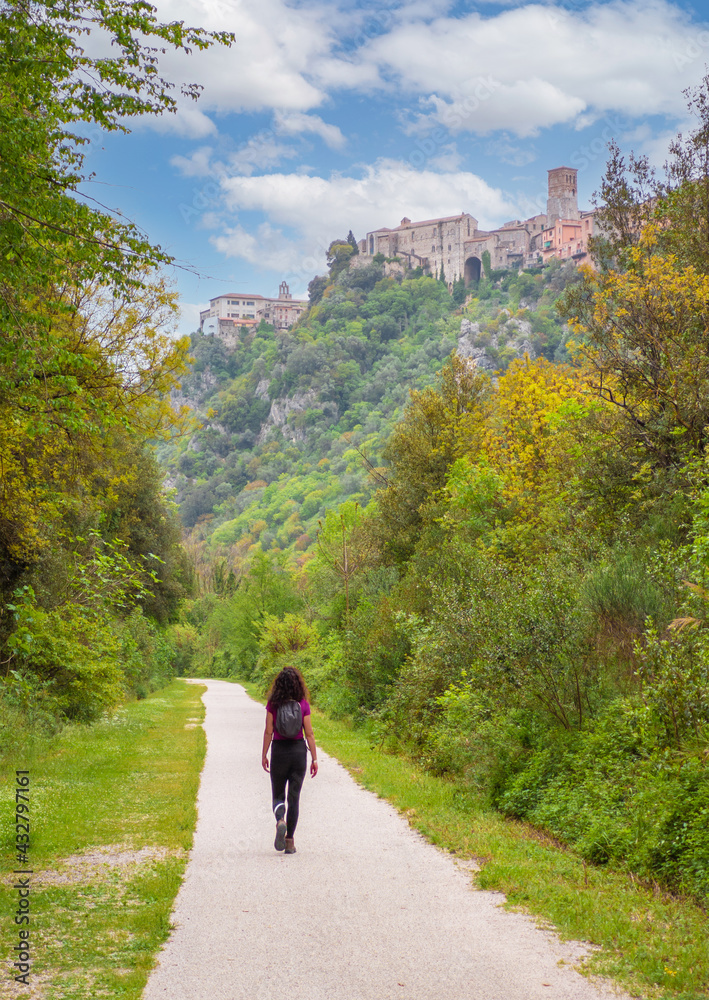 Gole del Nera (Narni, Italy) - The old railway transformed in a cycle path, with the evocative landmarks of the medieval village of Stifone and the crystalline water of Mole; Umbria region.