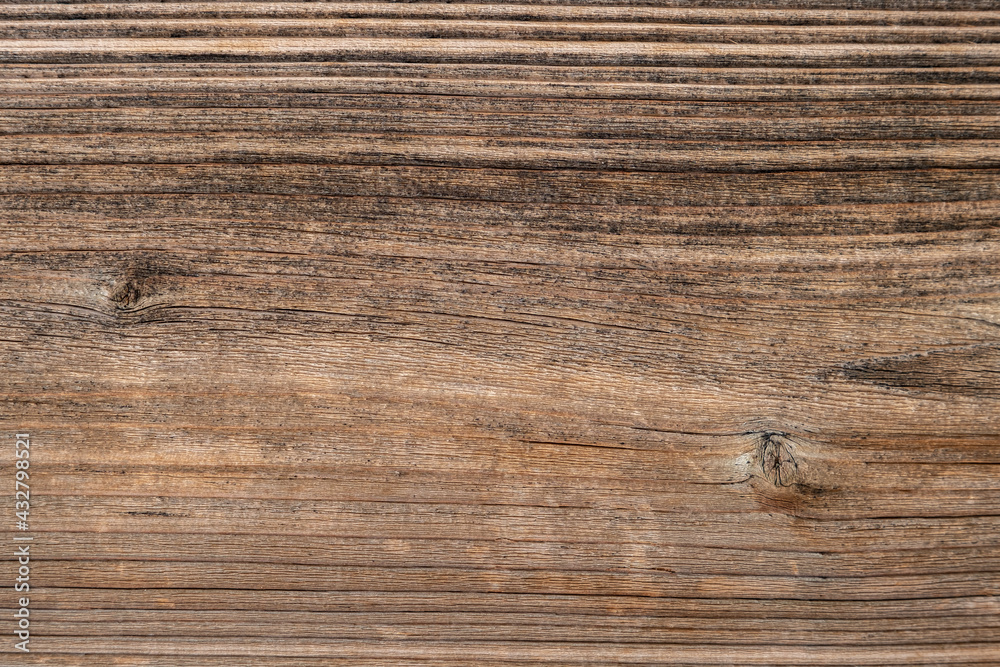 Rustic wooden plank in dark natural colour with texture Rustic wooden plank in dark natural colour with texture