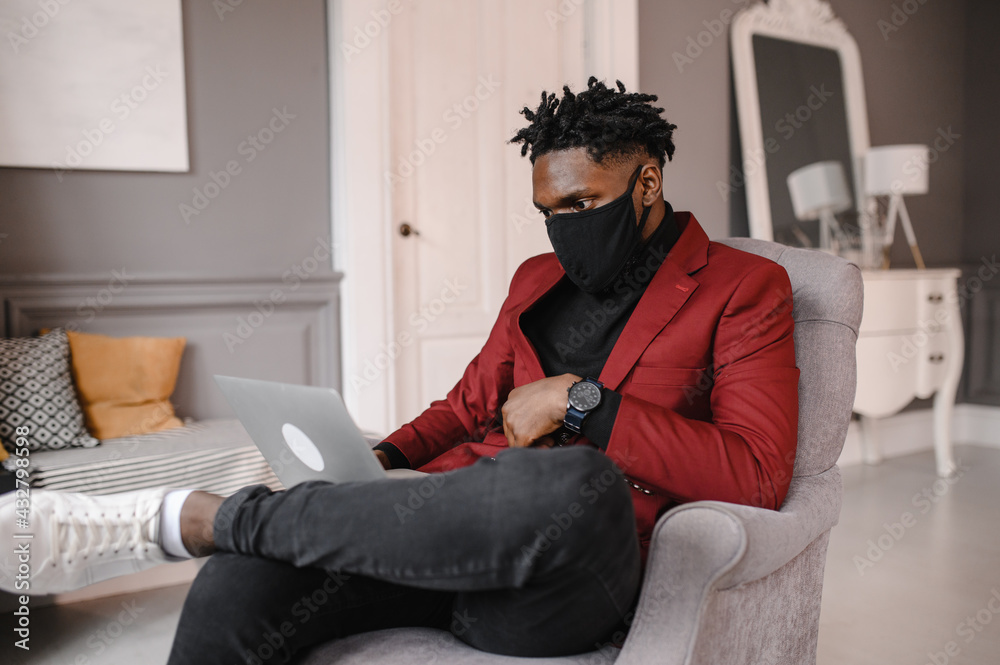 Confident young african man look at webcam conference video calling in office, happy mixed race entrepreneur talking doing online video chat job interview sit at desk Confident young african man look at webcam conference video calling in office, happy mixed race entrepreneur talking doing online video chat job interview sit at desk