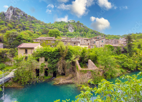 Gole del Nera  Narni  Italy  - The old railway transformed in a cycle path  with the evocative landmarks of the medieval village of Stifone and the crystalline water of Mole  Umbria region.