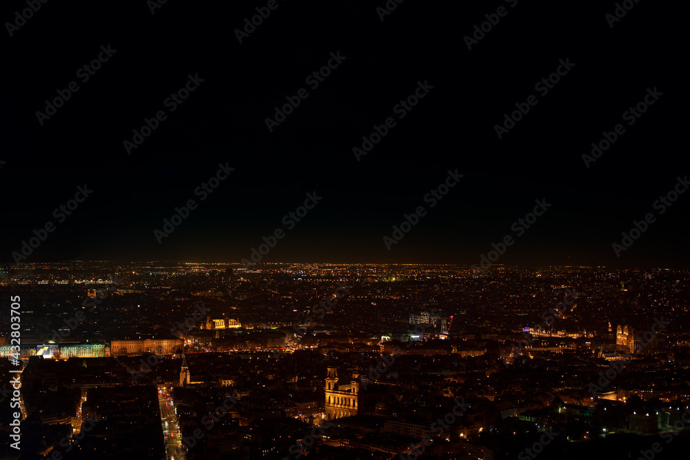 Aerial view of Paris in the night . France capital city in the nighttime . European big city in the night illumination