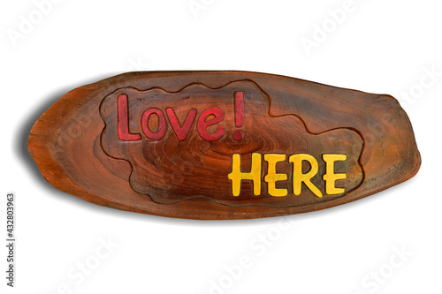 Wooden sign with text love here isolated on white background. This has clipping path. 