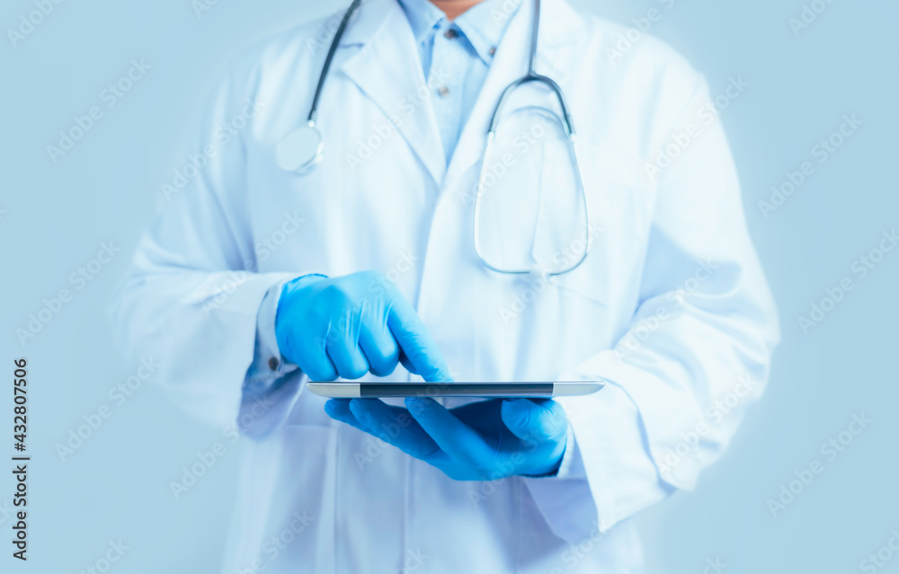 Healthcare And Medicine. Medical and technology. Doctor working on digital tablet on white background. Healthcare And Medicine. Medical and technology. Doctor working on digital tablet on white background.