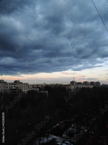 Thunderous clouds. the sleeping area of ​​Moscow is visible