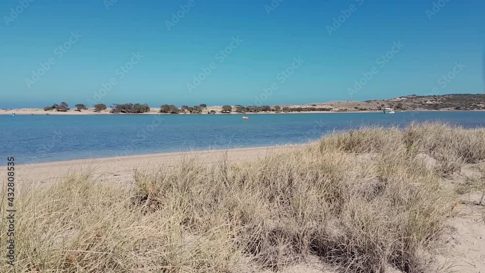 long time lapse of a beach in a sunny day with clear water in Australia long time lapse of a beach in a sunny day with clear water in Australia