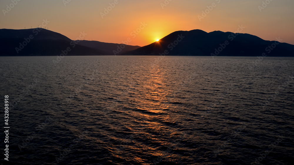 Mountain silhouettes, at sunset in the Ionian island of Kefalonia Mountain silhouettes, at sunset in the Ionian island of Kefalonia